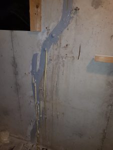 Foundation crack filled with injected polyurethane resin