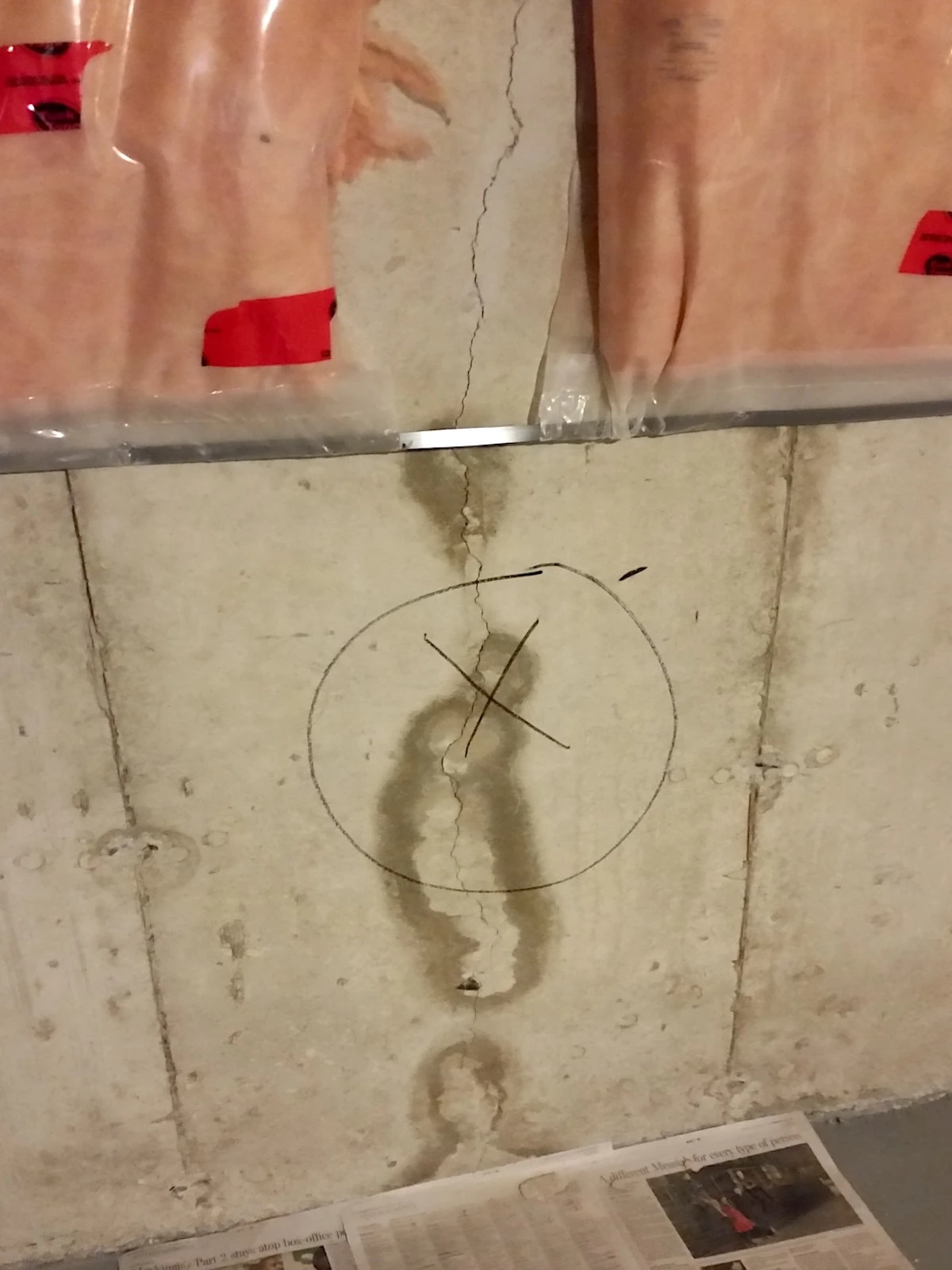 Wet drywall and stained baseboards caused by a concealed moisture problem